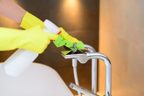 Professional carpet cleaner in Nottinghill working on a residential carpet
