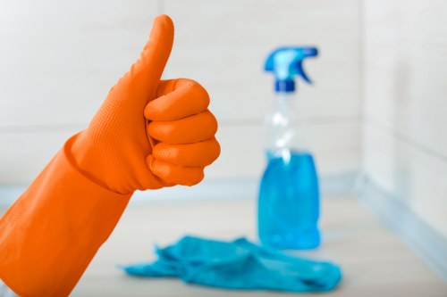 Cleaner reviewing cancellation and access requirements