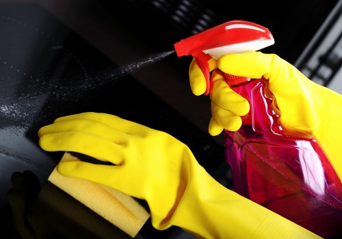 Technician cleaning a velvet sofa in Nottinghill